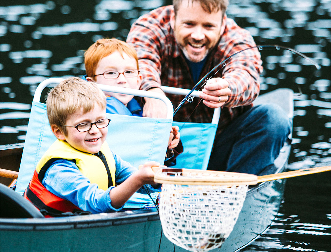 fishing-at-lake-with-family